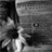 Black-and-white animated icon with repeating sunflower-like flowers and pixelated text reading REAL LOVE STORIES NEVER HAVE AN ENDING.
