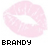 Nine pink lip prints arranged in a , each with the word "BRANDY" below it in pixelated text