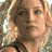 A woman with blonde hair appears in showing varying brightness and text overlays