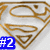 Golden Superman S shield outline on white background with blue text overlays reading #2, my hero, and (still) =/.