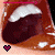 A 2x2 contact sheet of four animated frames showing a close-up of lips with varying mouth shapes and heart symbols, each frame featuring pink lines that change position across the sequence.
