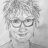 Pixelated grayscale portrait of a person with short curly hair, wearing rectangular eyeglasses, and a subtle smile, set against a plain light background.