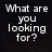 Pixelated white text on black background reads 'What are you looking for?' with visible pixelation and slight blurring.