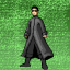 Pixelated figure in long dark coat stands against green background with subtle pose variations