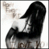 A woman with long dark hair viewed from behind, wearing a white top and black arm sleeves, with text overlays reading "Don't Forget Me" and "I LOVE YOU".