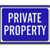 Blue rectangular sign with white pixelated text reading PRIVATE PROPERTY, bordered by light gray and dark blue frames.