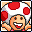 Pixelated character with red mushroom cap, orange skin, and open mouth smiling in first frame; same character with closed mouth in second frame.