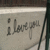 A static image shows a light gray background with dark gray text reading 'i Love you' in a handwritten style, framed by darker borders.