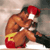 Static pixelated image of a cartoon boxer in red gloves and shorts with yellow accents, viewed from the side against a neutral background.