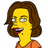 Pixelated cartoon character with yellow skin, brown shoulder-length hair, and an orange top, smiling with visible teeth and pink lips.
