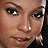 A 4-frame contact sheet of a pixelated animated icon featuring close-up portraits of a woman with varying color filters and text reading "Ashanti CHAPTER 2" on the bottom right frame.