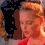 A four- shows a person with light brown hair in a red top, displaying subtle facial expression changes