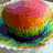Four distinct cupcake images arranged in a , each with unique toppings and color schemes