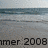 A beach scene with water and sand, featuring text 'mer 2008' in the lower portion of each frame.
