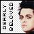 Pixelated static buddy icon featuring vertical text and a partial human face on transparent background.