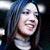 A 50x50 pixel buddy icon featuring a split composition with a person on the left and green text on the right, displayed as part of an animated contact sheet.