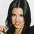 A split-screen image shows a woman with long dark hair in two poses: one holding an object near her face, the other resting on a brown surface.