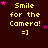 Dark red background with yellow text "Smile for the Camera! =]" repeated in a , pink stars scattered throughout, one partially grayed out