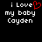 Black background with white pixelated text reading "i Love my baby Cayden" and a red heart symbol replacing the 'o' in Love.