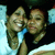 Two people in close pose with one person's arm around the other, smiling in a static image with visible pixelation.