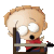 Pixelated cartoon character with light brown hair, large white eyes, and a red shirt sitting at a desk with a microphone.