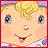 Pixelated cartoon face with blonde hair, blue eyes, and a smiling mouth on a peach background with red border.