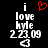 Black background with white text reading 'i love kyle 2.23.09' and a red heart symbol above the word 'love', transitioning to a white outline of the same heart below.