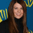 A pixelated image shows a person with long brown hair wearing a black top against a blue background with yellow patterns, next to pink text reading "Lauren Graham fox my sox!".