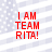Red text reading "I AM TEAM RITA!" on a pixelated background with light blue and white stripes.