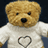 Animated contact sheet of a teddy bear icon with changing text and heart symbols across five frames.