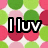 Pixelated icon with four distinct sections: top-left green and pink polka dots, top-right light blue background with dark circles, bottom-left pink dots on white, and bottom-right gray area.