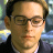 A 48x48 pixel buddy icon featuring a split composition with a person on the left and green text on a dark background on the right, displayed as part of an animated contact sheet.