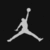A pixelated white silhouette of a basketball player in mid-air with arms extended, next to the number 23 on a black background.