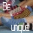 Pixelated image of a person in a red top and blue pants holding a brown checkered bag, with 'BE' text in top-left and 'Unique' text in bottom-right.