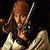 A pixelated image of a character with long brown hair and a white shirt, overlaid with red text reading "We're goin' after the pearl mate" across multiple