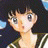 A pixelated anime-style character with short brown hair and large eyes appears on the left side of a contact sheet, while the right side displays stylized text "Anime IM" above smaller cursive text against a black background.