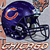 Static pixelated image of a dark blue football helmet with an orange and white 'C' logo on the side, set against a light gray background.