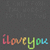 Pixelated text 'i love you' in gradient colors on a dark gray background with faint pixelated patterns.