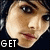 A pixelated image of a person's face with text overlays reading 'GET', 'ME', and 'OUT!' in separate sections.