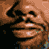 A static image featuring a central figure with two side showing close-ups of the same person's mouth, accompanied by text elements including 'IF YOU CAN'T GET OUT EVEN' and 'LONGEST YARD'