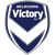 A shield-shaped icon with a dark blue and white color scheme featuring the word "Victory" in pixelated text across the top section.