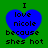 Four identical blue heart-shaped icons with black text on a green background, each displaying "I love nicole because shes hot" in pixelated font.