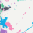 Pixelated static image with scattered colored squares and abstract shapes on white background, featuring blue star-like form, pink curved shape, green blocky element, purple square, and cyan line segment.