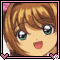 Pixelated anime-style character with brown hair and green eyes, smiling in a pink-bordered frame with heart accents.