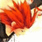 Static image of a character with bright red hair styled in sharp spikes, wearing dark clothing against a light background.