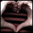 Two hands form a heart shape with striped fabric visible inside, next to red text reading "Courney loves Dan!" on a dark gradient background.