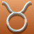 Two identical Taurus zodiac symbols rendered in light blue with white highlights on a solid brown background.