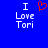 Blue background with white text reading "I Love Tori" on both sides, red pixelated heart symbol replacing the word "love" in left-side version.