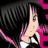 Anime-style character with black hair and pink highlights, holding a microphone, with text overlays reading 'That pic above this one was m and i am' and 'I'm a hippie!' in a circular frame.