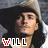 A static image of a person with long dark hair wearing a light-colored hooded garment, overlaid with the text "WILL" in stylized lettering.